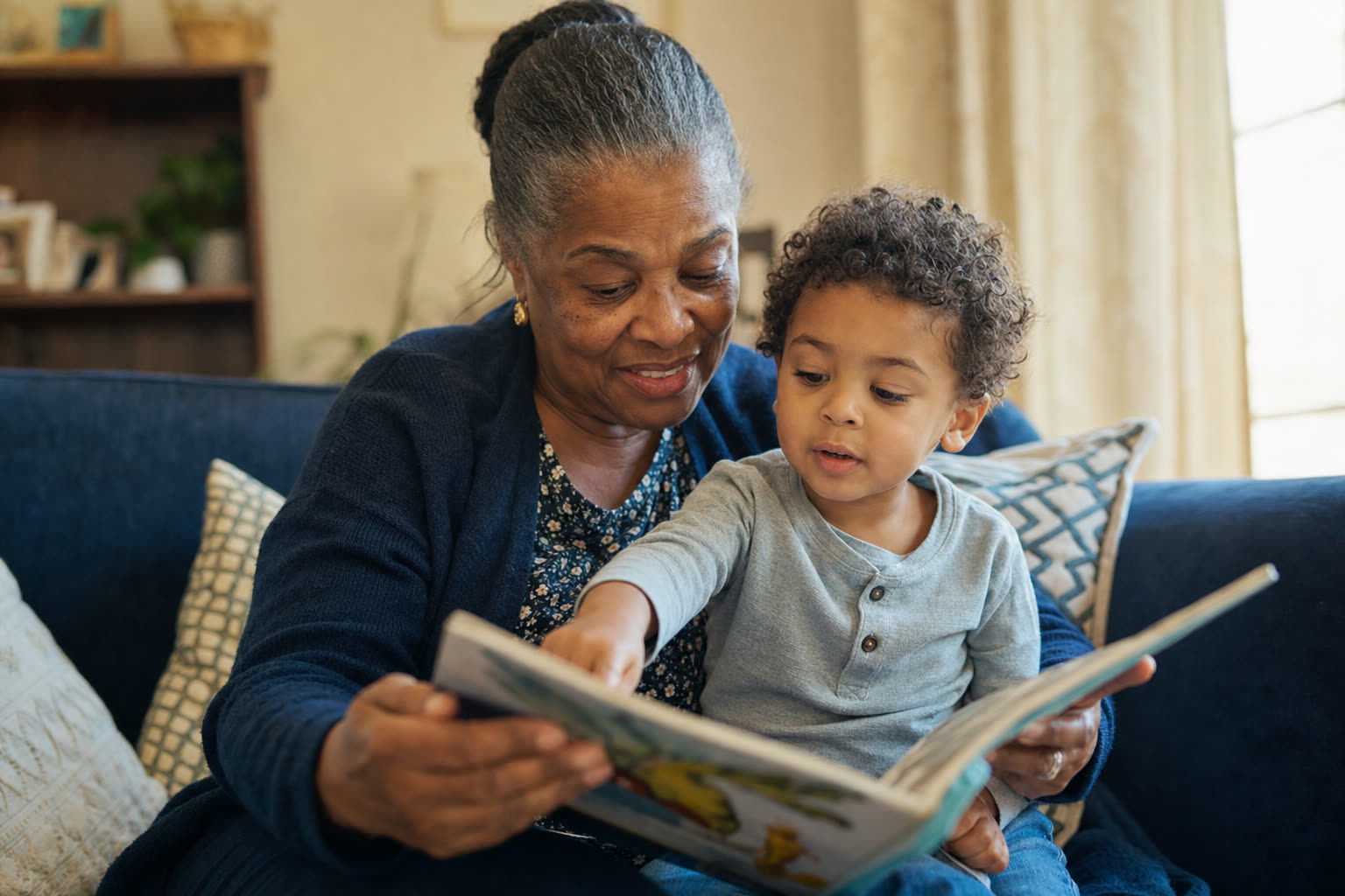 A grandmother reading with her young grandchild
